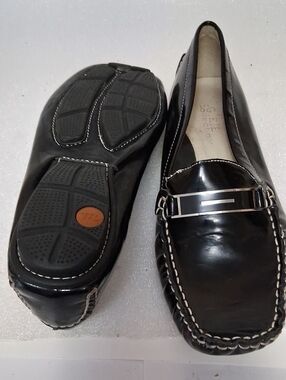 Women's Black Leather Slip-On Loafers with Silver Accent